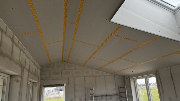Renovering af hus med nyt loftdesign og gipsarbejde.